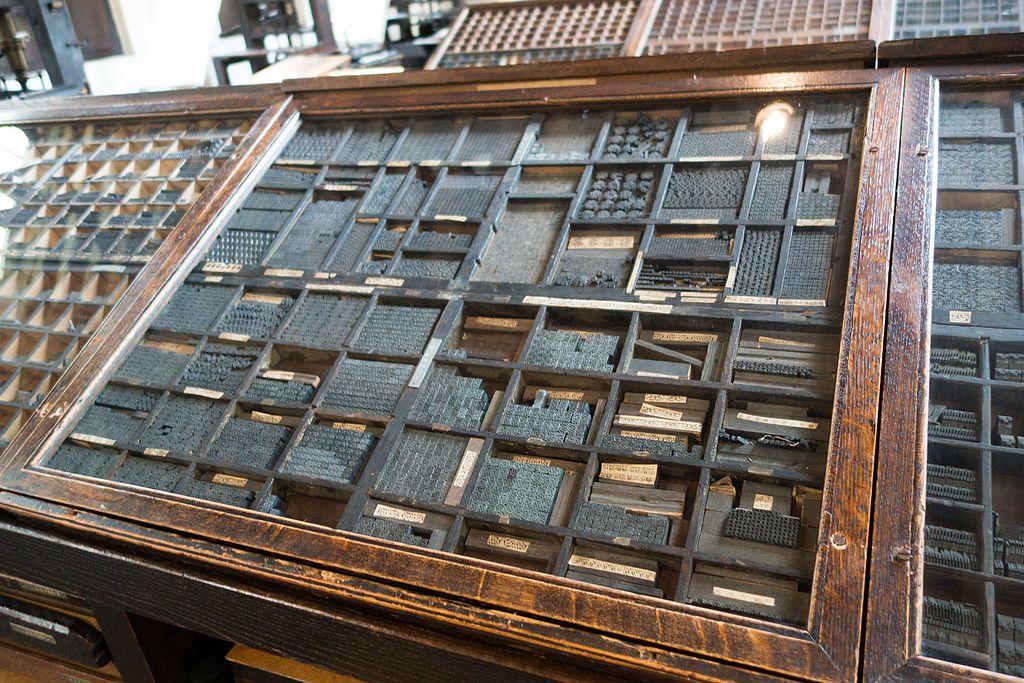 Image of typesetters drawer: Photo Credit: Thomas Quine, CC BY 2.0, by Wikimedia Commons
